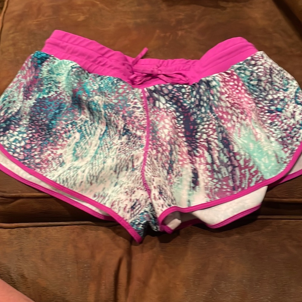 Fabletics running shorts with attached brief and interior pocket size medium